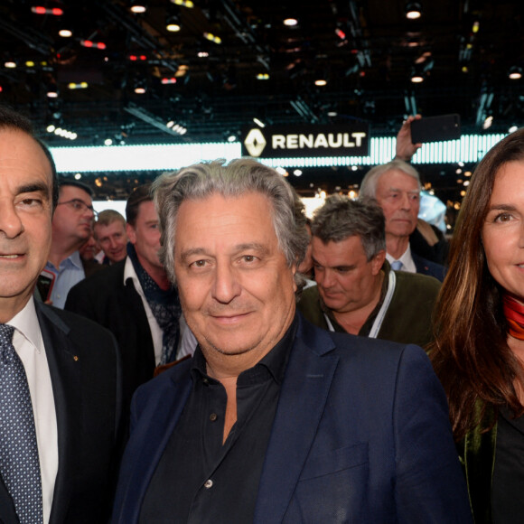 Exclusif - Carlos Ghosn (Président-directeur général de Renault), Christian Clavier et sa femme Isabelle de Araujo - Soirée Renault à l'occasion de l'ouverture de la 120ème édition du Mondial de l'Automobile 2018 au Paris Expo Porte de Versailles à Paris le 2 octobre 2018. © Rachid Bellak/Bestimage 