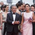 Christian Clavier et sa femme Isabelle De Araujo (Bijoux APM Monaco) - Montée des marches du film "Jimmy's Hall" lors du 67 ème Festival du film de Cannes – Cannes le 22 mai 2014.   