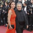 Christian Clavier et sa compagne Isabelle De Araujo lors de la première du film "The Immigrant" lors du 66e Festival du Film de Cannes, le 24 mai 2014   