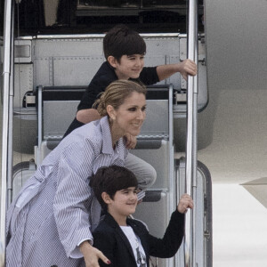 Eddy et Nelson Angelil - Celine Dion quitte l'hôtel Royal Monceau avec ses enfants et prend un jet privé au Bourget le 10 août 2017. © Pierre Perusseau / Bestimage