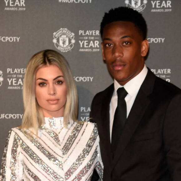 Anthony Martial et sa femme Samantha lors de la soirée du prix du joueur de l'année de Manchester United 2019 au stade Old Trafford à Manchester, Royaume Uni, le 9 mai 2019. 