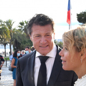 Charles Anges Ginesy, le président du Conseil Départemental des Alpes-Maritimes, Christian Estrosi, le maire de Nice, et sa femme, Laura Tenoudji Estrosi durant le défilé militaire lors de la Cérémonie du 14 juillet à Nice, esplanade Jacques Cotta. © Bruno Bebert / Bestimage