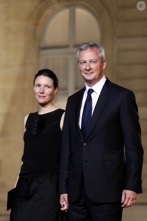 Bruno Le Maire, ministre de l'Economie et des Finances et sa femme Pauline Doussau de Bazignan - Dîner d'Etat du président de la République française en l'honneur du président de la République populaire de Chine lors de sa visite d'Etat en France du 24 au 26 mars 2019, au Palais de l'Elysée, à Paris, France, le 25 mars 2019. © Stéphane Lemouton/Bestimage 