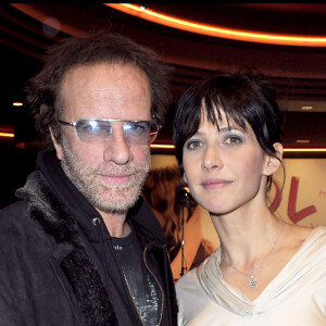 Christophe Lambert et Sophie Marceau- Première du film "LOL" au cinéma Gaumont Marignan à Paris.