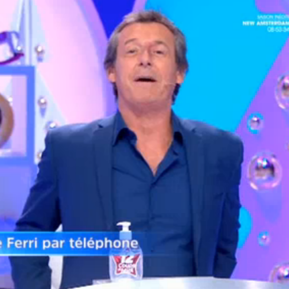 Jean-Luc Reichmann au téléphone avec Karine Ferri dans "Les 12 coups de midi" - TF1, 25 novembre 2020