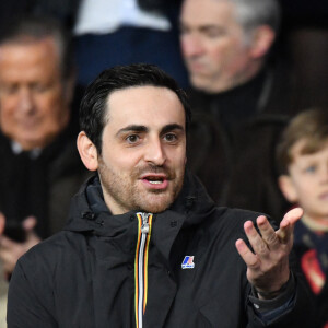 Camille Combal dans les tribunes du parc des Princes lors du match de football de ligue 1, opposant le Paris Saint-Germain (PSG) contre l'Olympique de Marseille (OM) à Paris, France, le 17 mars 2019. Le PSG a gagné 3-1.