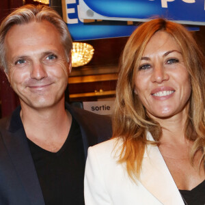 Mathilde Seigner et son compagnon Mathieu Petit - Arrivee des people a la generale de Muriel Robin "Robin Revient" au Theatre de la Porte Saint Martin a Paris.