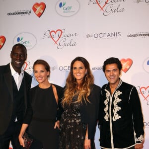 Omar Sy, Mélissa Theuriau, Hélène Sy et Jamel Debbouze - Personnalités au gala "Par Coeur" pour les 10 ans de l'association "Cekedubonheur" au pavillon d'Armenonville à Paris. Le 24 septembre 2015 
