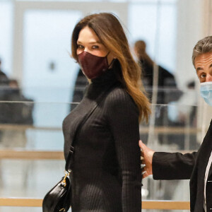 1er jour des plaidoiries de la défense - Nicolas Sarkozy arrive avec sa femme Carla Bruni Sarkozy procès des "écoutes téléphoniques" ( affaire Bismuth) au tribunal de Paris le 9 décembre 2020. © Christophe Clovis / Bestimage
