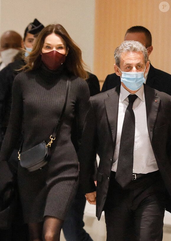 1er jour des plaidoiries de la défense - Nicolas Sarkozy arrive avec sa femme Carla Bruni Sarkozy procès des "écoutes téléphoniques" ( affaire Bismuth) au tribunal de Paris le 9 décembre 2020. © Christophe Clovis / Bestimage