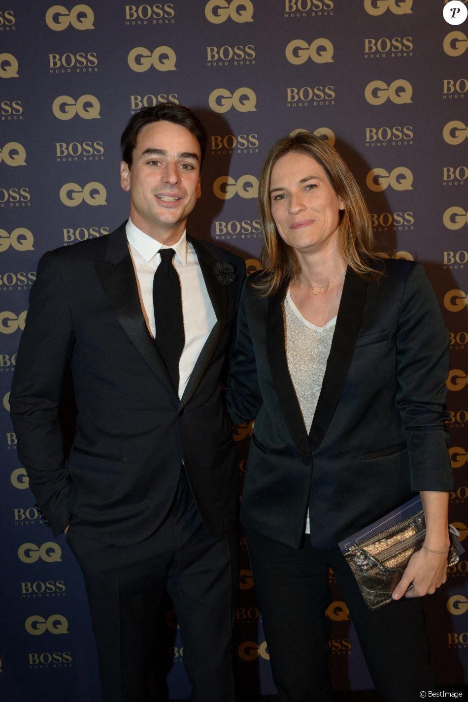 Julian Bugier et sa femme Claire Fournier lors de la soirée "L'homme de l'année GQ 2014" au Musée d'Orsay, à Paris.
