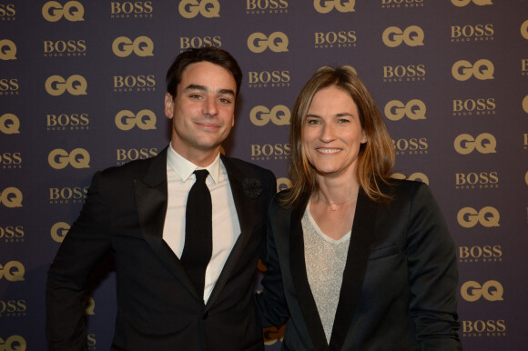 Julian Bugier et sa femme Claire Fournier lors de la soirée "L'homme de l'année GQ 2014" au Musée d'Orsay, à Paris le 19 novembre 2014.