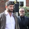 George Michael quitte son domicile avec son petit-ami Fadi Fawaz à Londres.