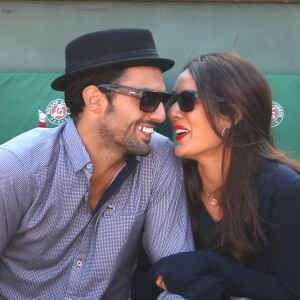 Sofia Essaïdi et son compagnon Adrien Galo - People dans les tribunes de Roland Garros lors de la Coupe Davis. Le 12 septembre 2014