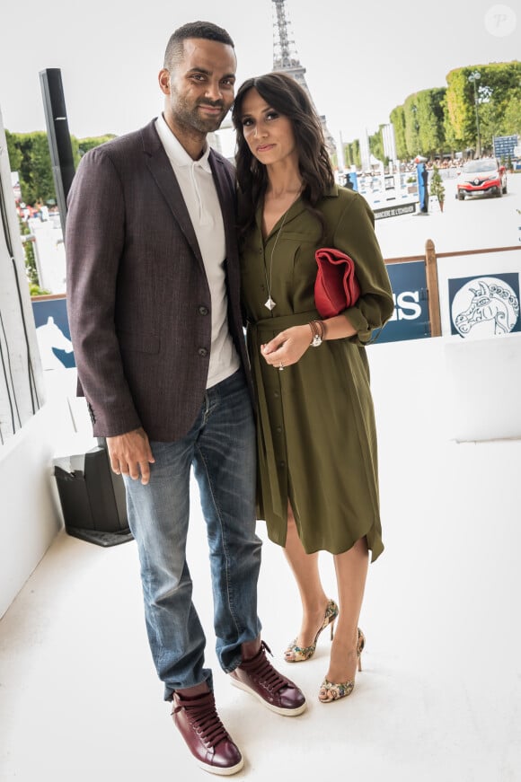 Exclusif - Tony Parker et sa femme Axelle Francine - People lors du Longines Paris Eiffel Jumping au Champ-de-Mars à Paris, le 5 juillet 2015.