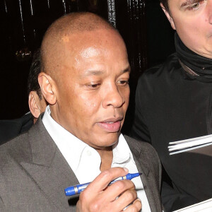 Dr. Dre et sa femme Nicole Threatt à la sortie du club Loulou's dans le quartier de Mayfair à Londres, Royaume Uni, le 14 mars 2018. 