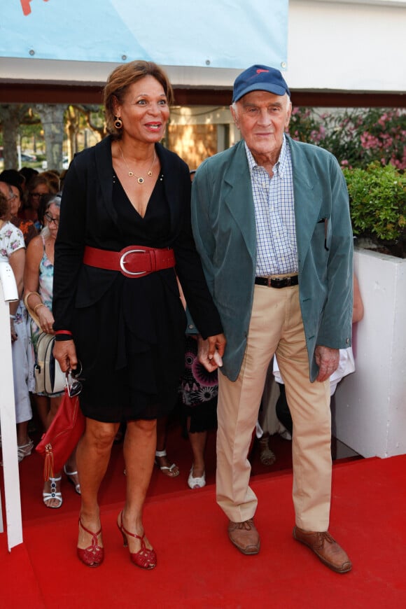 Rémy Julienne et sa compagne Justine - Première du film "Le Jeu de la vérité" lors de la cérémonie de clôture du 11e festival "Les Hérault du cinéma et de la télé 2014" au Cap d'Agde, le 5 juillet 2014.