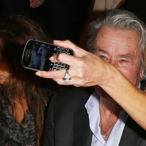 Alain Delon et Rosalie Van Breemen - People au defile de mode Elie Saab - Collection pret-a-porter printemps-ete 2013 à Paris