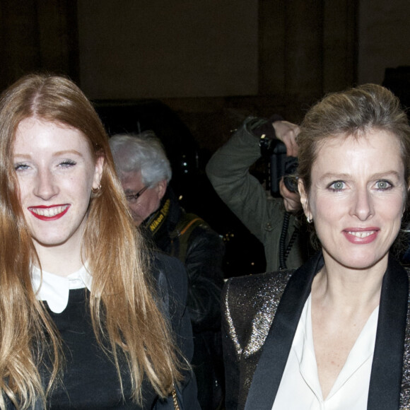 Karin Viard et sa fille aînée Marguerite - Défilé Lanvin lors de la fashion week à Paris le 27 février 2014.
