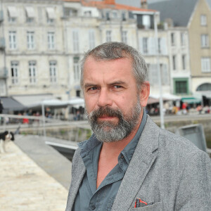 Philippe Torreton pose pour le photocall du telefilm ' Intimes Convictions ' durant le 15e Festival de la Fiction Tv de La Rochelle, France le 12 Septembre 2013.