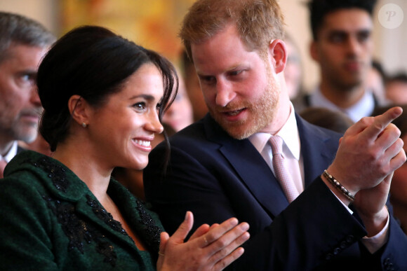 Le prince Harry, duc de Sussex, Meghan Markle, enceinte, duchesse de Sussex, lors de leur visite à Canada House dans le cadre d'une cérémonie pour la Journée du Commonwealth à Londres le 11 mars 2019. 