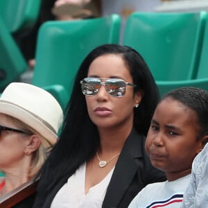 Mike Tyson en famille avec sa femme Kiki (Lakiha Spicer) et leur fille Milan Tyson dans les tribunes des internationaux de tennis de Roland Garros à Paris, France, le 3 juin 2018. © Dominique Jacovides - Cyril Moreau/Bestimage