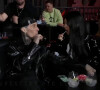 Kourtney Kardashian et son compagnon Travis Barker assistent à l'UFC 260, combat de MMA opposant Francis Ngannou à Stipe Miocic. Las Vegas, le 27 mars 2021.