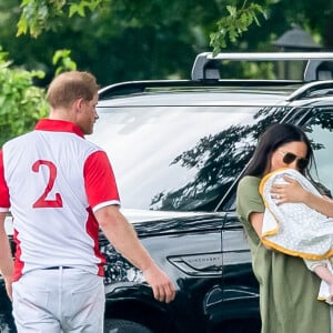 Le prince Harry, duc de Sussex, Meghan Markle, duchesse de Sussex et leur fils Archie Harrison Mountbatten-Windsor lors d'un match de polo de bienfaisance King Power Royal Charity Polo Day à Wokinghan, comté de Berkshire, Royaume Uni, le 10 juillet 2019.