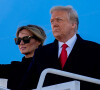 Donald Trump, accompagné de sa femme Melania, quitte la Maison-Blanche à l'issue de son mandat de président des Etats-Unis à Washington.