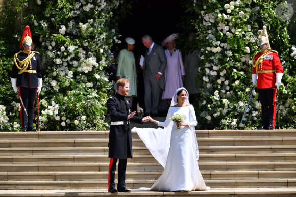 Le prince Harry, duc de Sussex, et Meghan Markle, duchesse de Sussex, à la sortie de chapelle St. George au château de Windsor - Sortie après la cérémonie de mariage du prince Harry et de Meghan Markle en la chapelle Saint-George au château de Windsor, Royaume Uni, le 19 mai 2018.