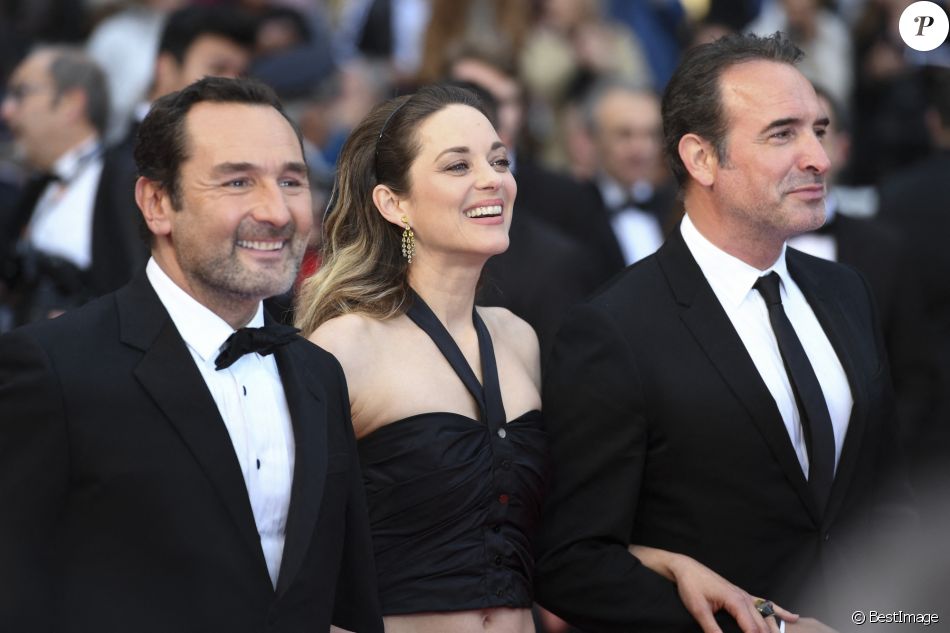 Gilles Lellouche, Marion Cotillard, Jean Dujardin à la première du film "La belle époque" lors du 72ème Festival International du Film de Cannes, France, le 20 mai 2019.