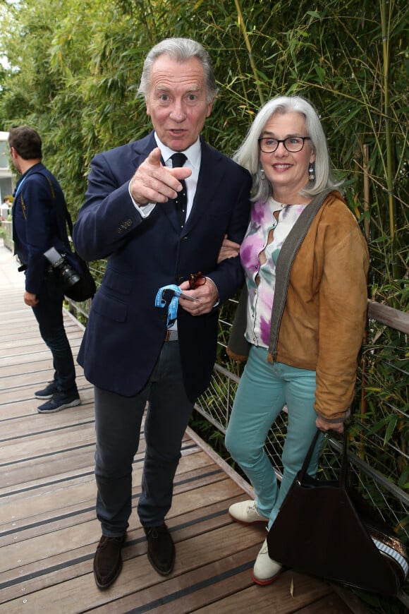 William Leymergie et sa femme Maryline au village des Internationaux de Tennis de Roland Garros le 26 mai 2016. © Dominique Jacovides / Bestimage