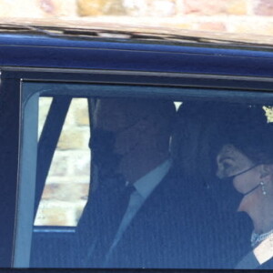 Le prince William, duc de Cambridge, et Catherine (Kate) Middleton, duchesse de Cambridge, arrivent aux funérailles du prince Philip, duc d'Edimbourg à la chapelle Saint-Georges du château de Windsor, Royaume Uni, le 17 avril 2021.