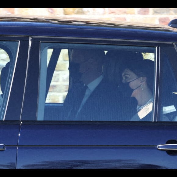 Le prince William, duc de Cambridge, et Catherine (Kate) Middleton, duchesse de Cambridge, arrivent aux funérailles du prince Philip, duc d'Edimbourg à la chapelle Saint-Georges du château de Windsor, Royaume Uni, le 17 avril 2021.