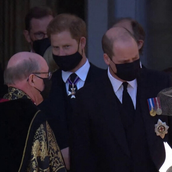 Le prince William, duc de Cambridge, et le prince Harry, duc de Sussex, Sorties des funérailles du prince Philip, duc d'Edimbourg à la chapelle Saint-Georges du château de Windsor, Royaume Uni, le 17 avril 2021. 
