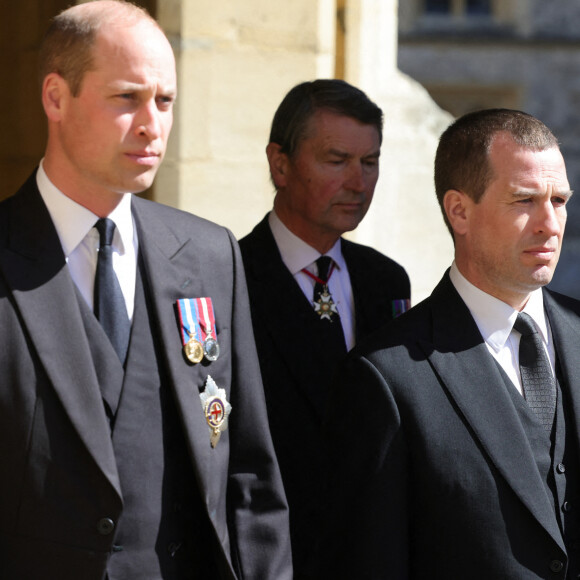 Le prince William, duc de Cambridge, et Peter Phillips - Arrivées aux funérailles du prince Philip, duc d'Edimbourg à la chapelle Saint-Georges du château de Windsor, le 17 avril 2021. 