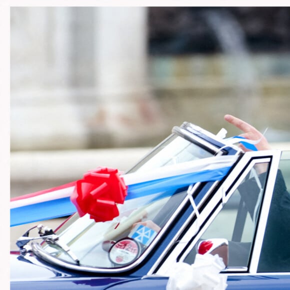 Le prince William, duc de Cambridge, et Kate Catherine Middleton, duchesse de Cambridge, quittent le palais de Buckingham en Aston Martin DB6 Volante, après la réception pour leur mariage. Le 29 avril 2011