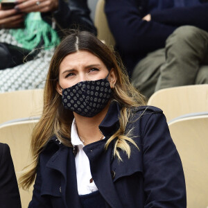 L'animatrice et ancienne Miss France 2015, Camille Cerf assiste au tournoi de tennis de Roland Garros à Paris, le 6 octobre 2020. Elle porte un masque de protection en raison de l'épidémie de coronavirus (Covid-19).