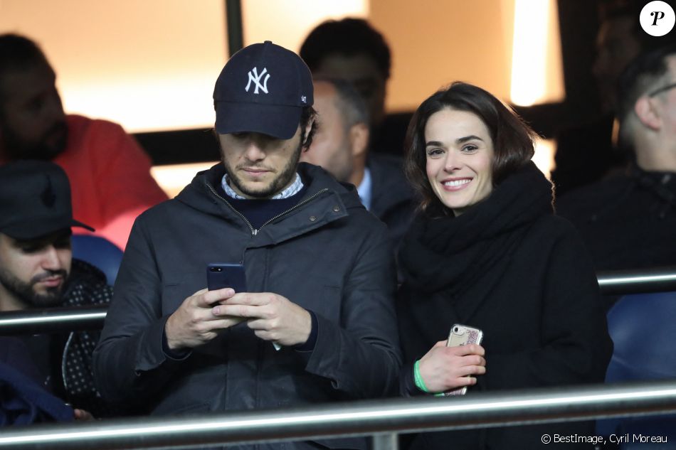 Vianney Bureau (Vianney) et sa compagne Catherine Robert dans les tribunes du parc des Princes lors du match de 8ème de finale retour de Ligue des champions opposant le Paris Saint-Germain à Manchester Unted à Paris, France, le 6 mars 2019. Manchester a gagné 3-1 (cumul des scores 3-3). © Cyril Moreau/Bestimage