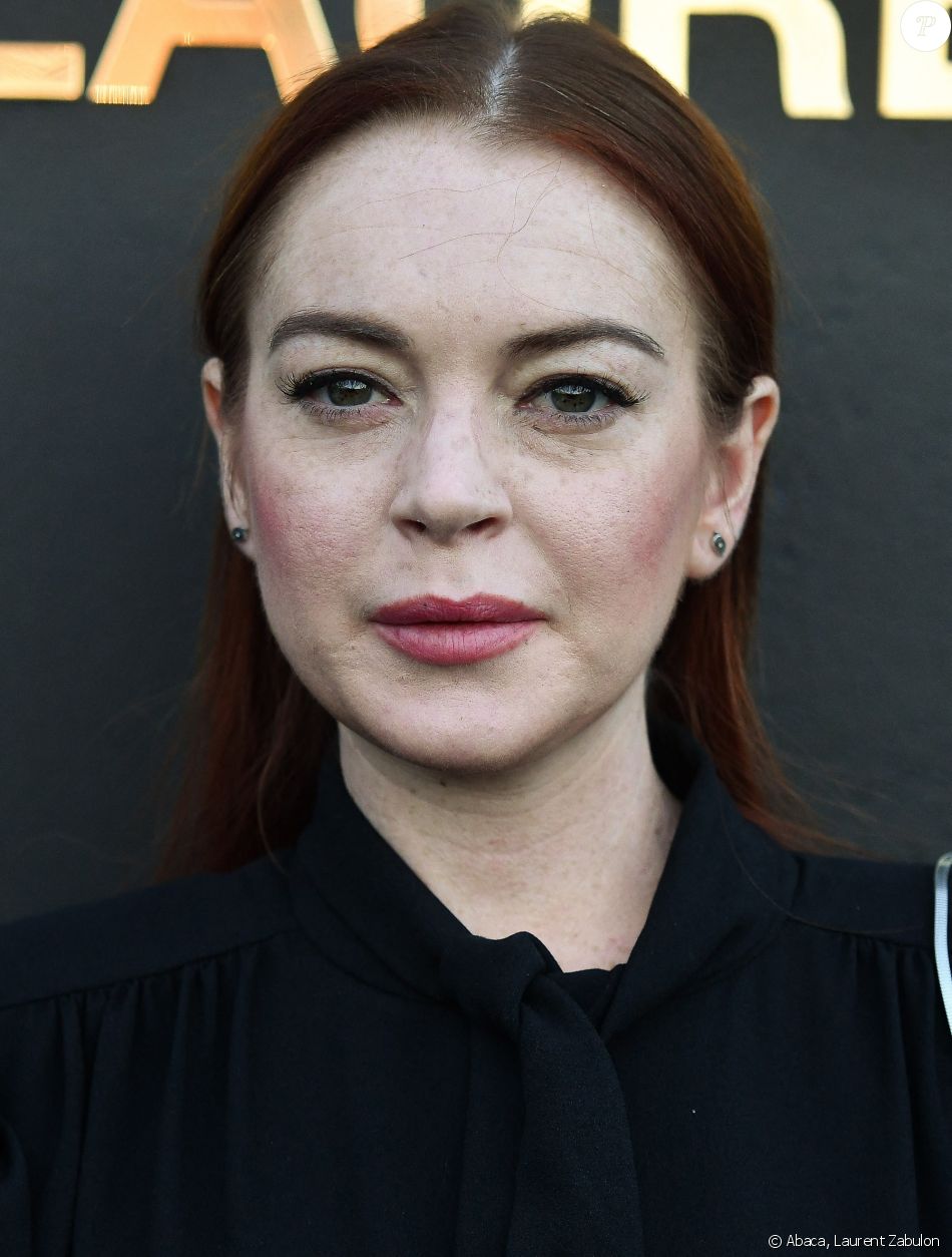 Lindsay Lohan assiste au défilé Saint Laurent lors de la Fashion Week de Paris, le 25 septembre 2018. @ Laurent Zabulon/ABACAPRESS.COM