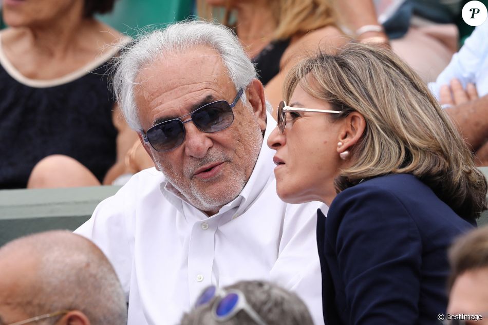 Dominique Strauss-Kahn (DSK) et sa compagne Myriam L'Aouffir dans les tribunes de Roland-Garros à Paris. Le 30 mai 2017