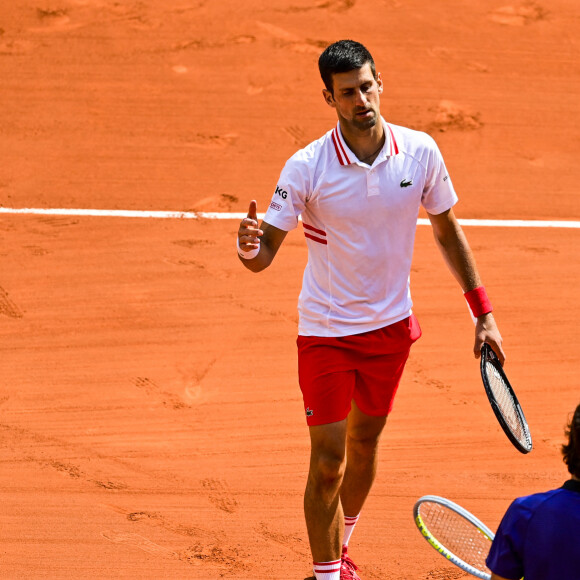 Novak Djokovic a battu Lorenzo Musetti sur abandon (au 5e set) lors des internationaux de France de Tennis de Roland Garros 2021. Paris, le 7 juin 2021. © JB Autissier/Panoramic/Bestimage