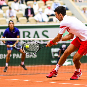 Novak Djokovic a battu Lorenzo Musetti sur abandon (au 5e set) lors des internationaux de France de Tennis de Roland Garros 2021. Paris, le 7 juin 2021. © JB Autissier/Panoramic/Bestimage