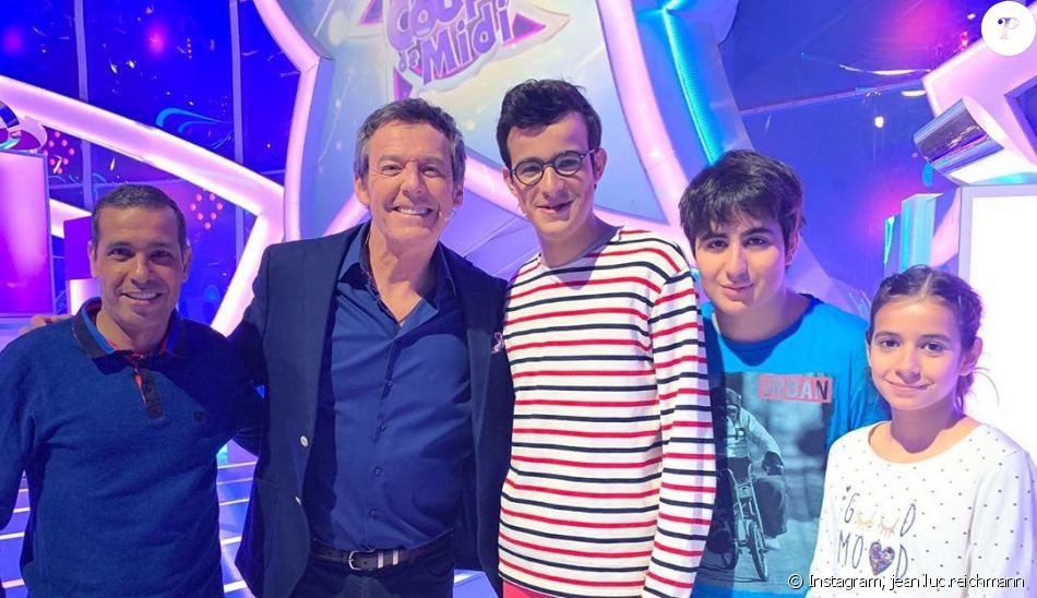Jean-Luc Reichmann avec Paul et sa famille, dans "Les 12 Coups de midi", le 22 mai 2019