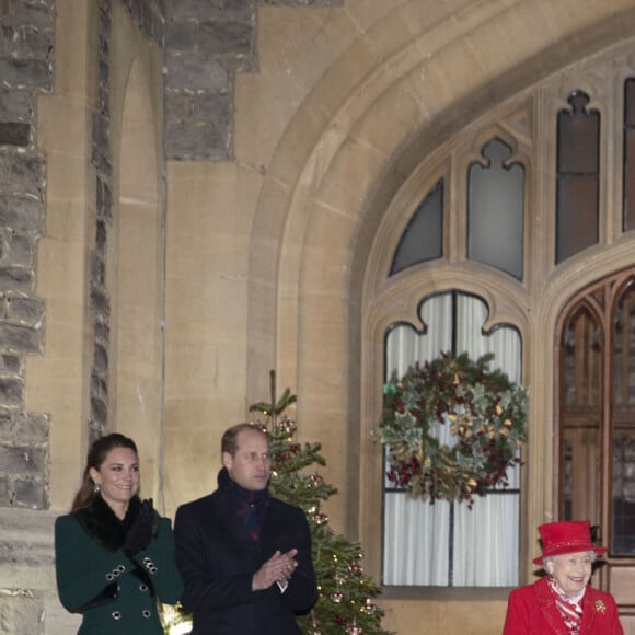 Catherine Kate Middleton, duchesse de Cambridge, le prince William, duc de Cambridge, la reine Elisabeth II d'Angleterre, le prince Charles, prince de Galles, Camilla Parker Bowles, duchesse de Cornouailles - La famille royale se réunit devant le chateau de Windsor pour remercier les membres de l'Armée du Salut et tous les bénévoles qui apportent leur soutien pendant l'épidémie de coronavirus (COVID-19) et à Noël le 8 décembre 2020.