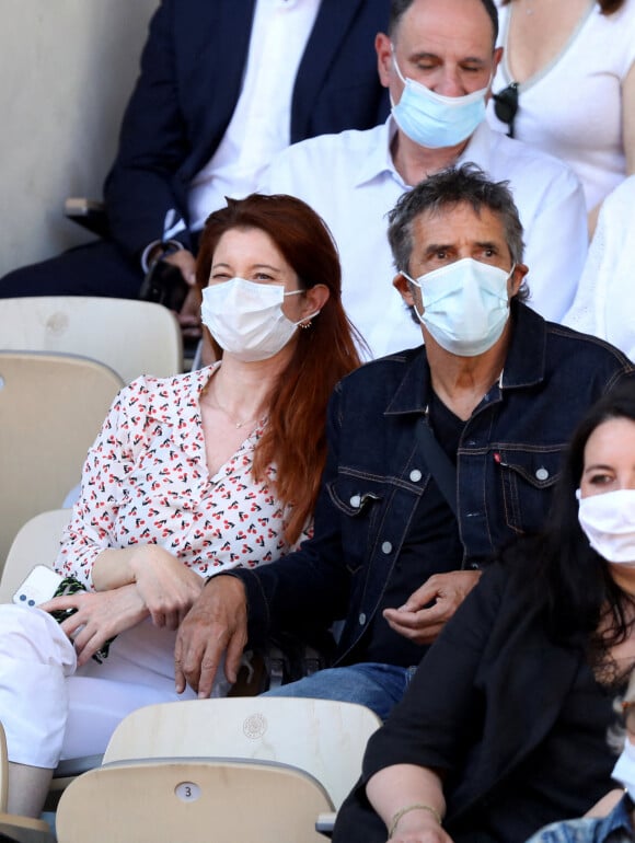 Julien Clerc et sa femme Hélène dans les tribunes des Internationaux de France de Roland Garros à Paris © Dominique Jacovides / Bestimage