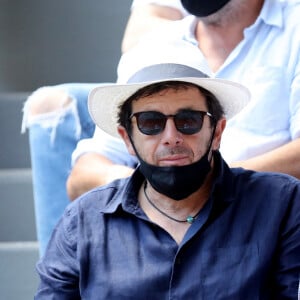 Patrick Bruel dans les tribunes des Internationaux de France de Roland Garros à Paris le 11 juin 2021. © Dominique Jacovides / Bestimage 