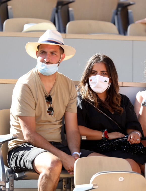 Inés Reg et son mari Kevin dans les tribunes des Internationaux de France de Roland Garros à Paris le 11 juin 2021. © Dominique Jacovides / Bestimage 