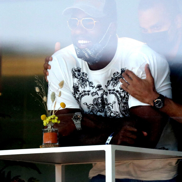 Teddy Riner et Tony Parker dans les tribunes des Internationaux de France de Roland Garros à Paris le 11 juin 2021. © Dominique Jacovides / Bestimage 