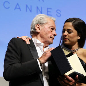 Alain Delon et sa fille Anouchka (Robe Elie Saab) - Remise de la Palme d'Honneur à Alain Delon lors du 72ème Festival International du Film de Cannes. Le 19 mai 2019 © Jacovides-Moreau / Bestimage